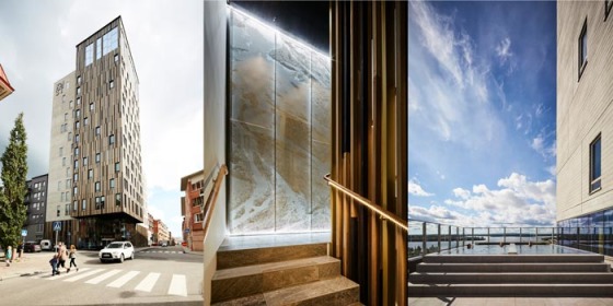Fasaden med aluminiumprofiler liknar timmerstockar. Trapphuset med mönster från älven. Terrass med pool på våning nio.