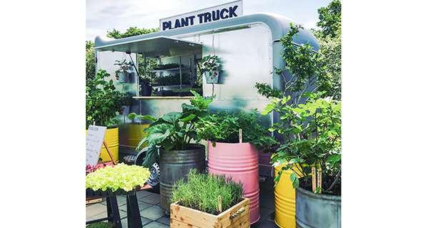 Grön food truck med prunkande växter vann pris